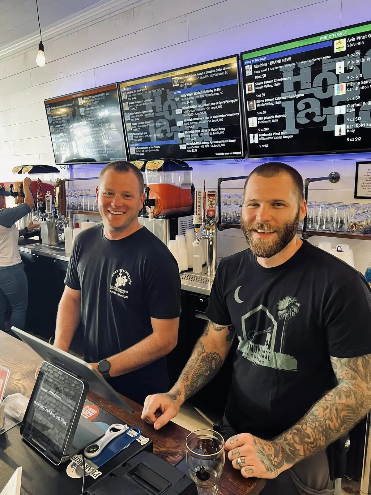 The Homeland team welcoming guests from behind the bar
